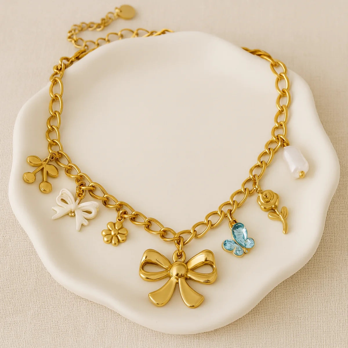 BOW CHARMS NECKLACE 85%