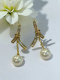 Golden Bow Pearl Drop Earrings
