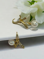 Golden Bow Pearl Drop Earrings