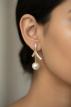 Golden Bow Pearl Drop Earrings
